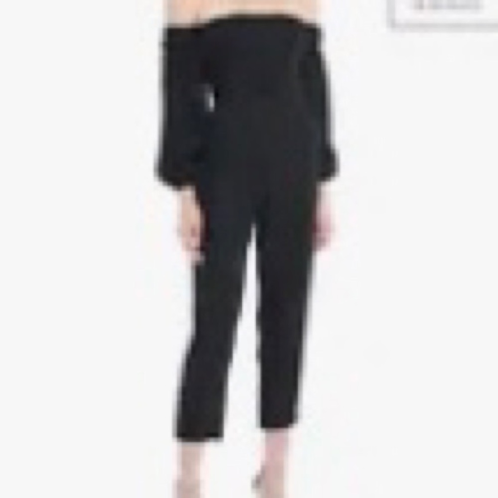 black Lost Ink belted jumpsuit with off the shoulder puffy sleeves. No more tags